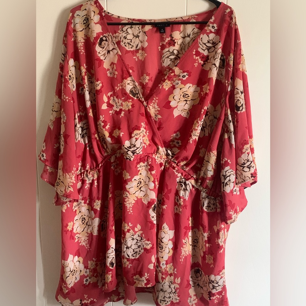 Torrid size 4 Coral Floral faux wrap empire elastic waist blouse.